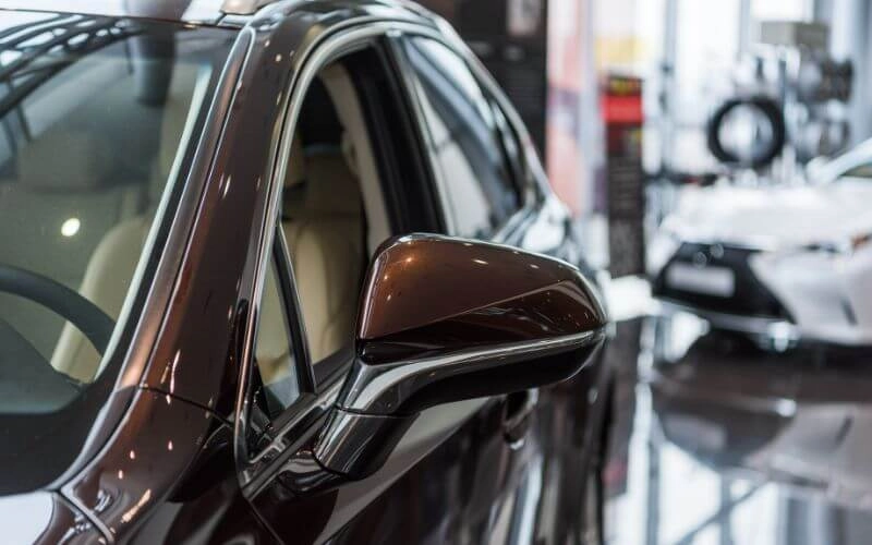 maroon-luxury-car-showroom-window-tinting